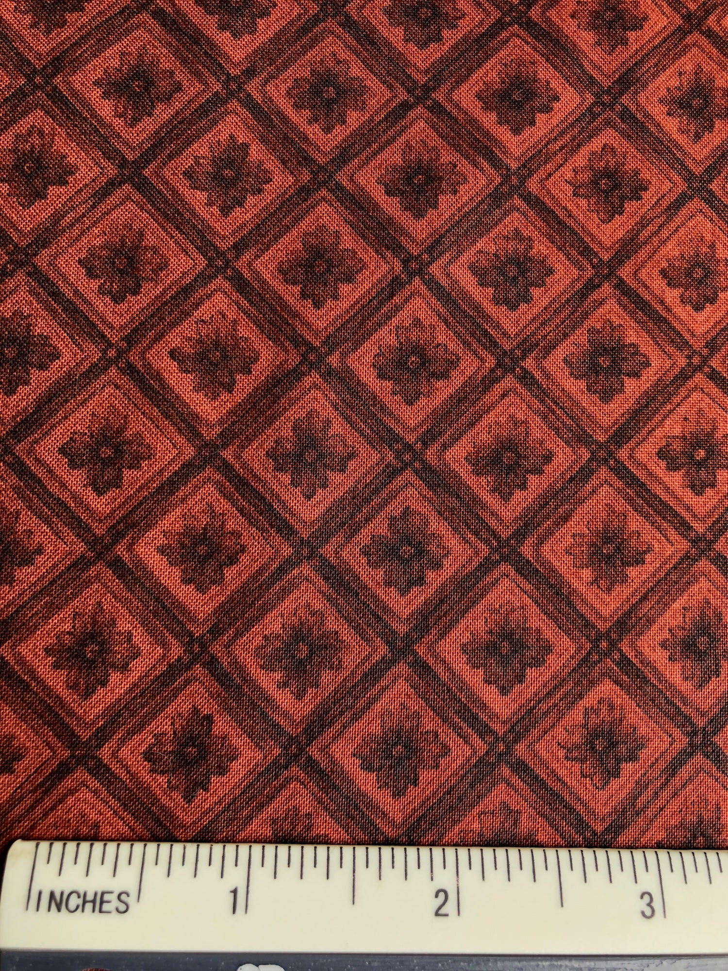 Quilt Gate Mary Rose Collection - FS400 - Red Brown background with a Dark Brown trellis & stylised flower print.