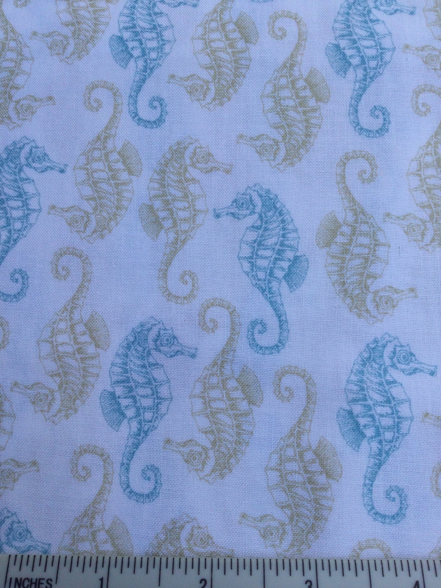 Beachcomber - FS114 - White background with Aqua Blue and Beige Seahorses print